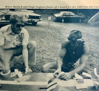 1980 Newspaper Clipping: Bruce Matlack and Hugh England gear up for the Pan Am Cup, a testament to the teamwork and tenacity that defines the windsurfing community.